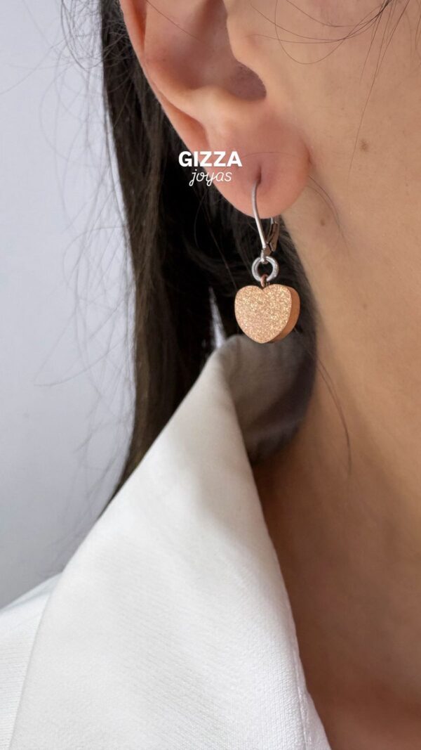 AROS DE ACERO CON CORAZÓNES ROSE ARENADOS