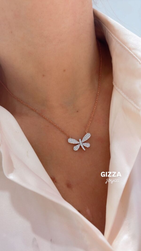 CONJUNTO DE PLATA RODINADA EN ROSE MODELO MARIPOSA C/CUBICS ENGARZADOS
