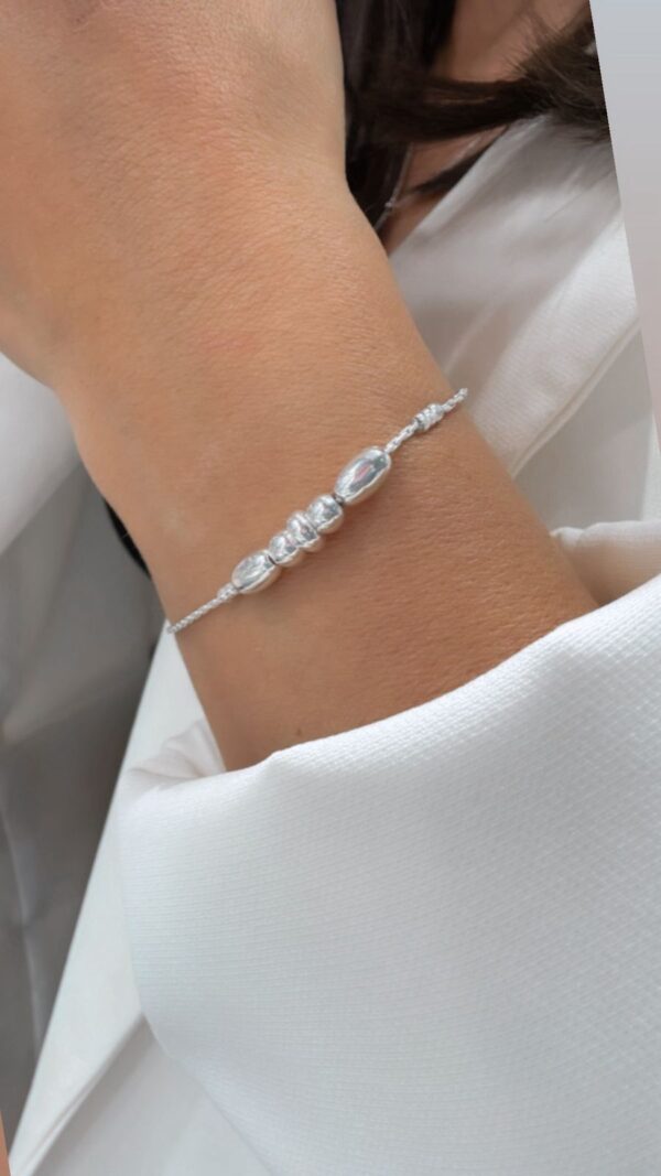 PULSERA DE PLATA CON ESFERAS Y SEMILLITAS