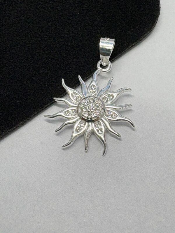 DIJE DE PLATA SOL