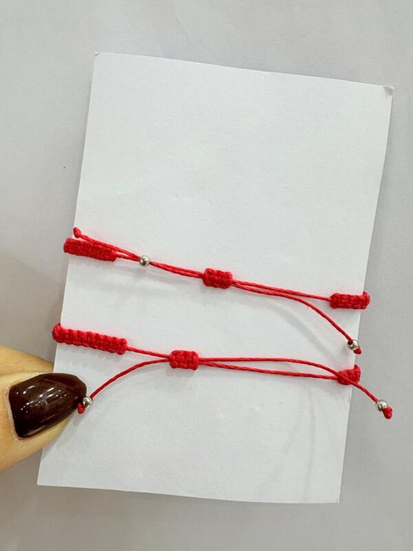 Set de pulseras de hilo y con corazon con iman - Image 3