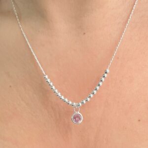 CONJUNTO de plata con dije con piedra rosa colgante