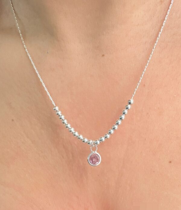 CONJUNTO de plata con dije con piedra rosa colgante
