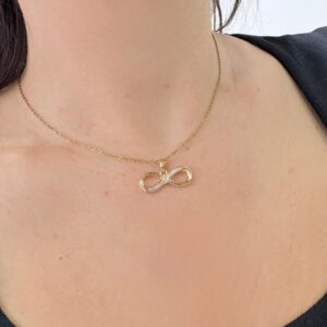 CONJUNTO de acero dorado diseño INFINITO