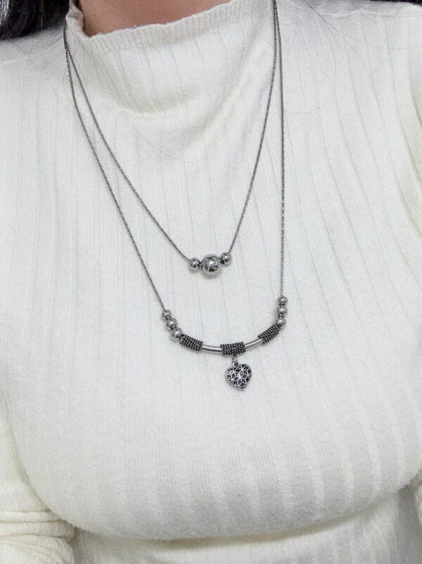 CONJUNTO de acero diseño doble cadena con CORAZÓN