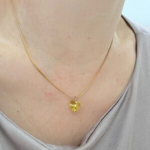 CONJUNTO de acero dorado diseño con corazón amarillo