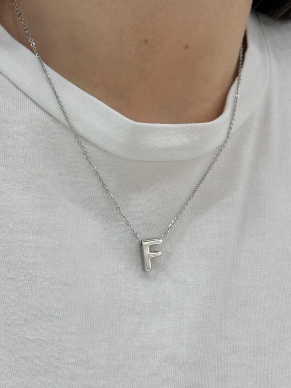 CONJUNTO de acero diseño con incial "F"