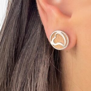 AROS DE ACERO CON DETALLE ROSE MODELO CORAZÓN