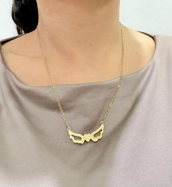 CONJUNTO de acero dorado diseño "CORAZÓN CON ALAS" - Image 2