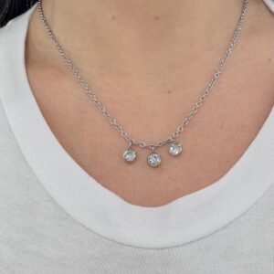 CONJUNTO de acero con dijes redondos colgantes