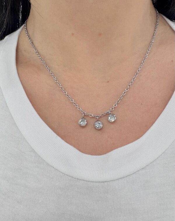 CONJUNTO de acero con dijes redondos colgantes