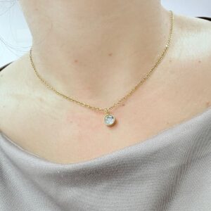 CONJUNTO de acero bañado en color dorado con circulo 6mm