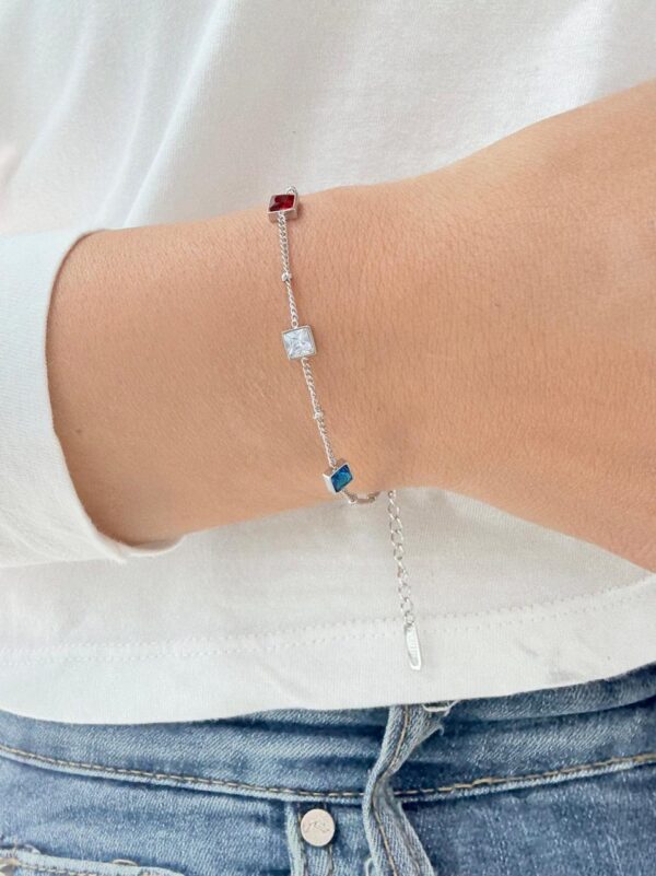 PULSERA de acero con diseño de cuadrados con piedras