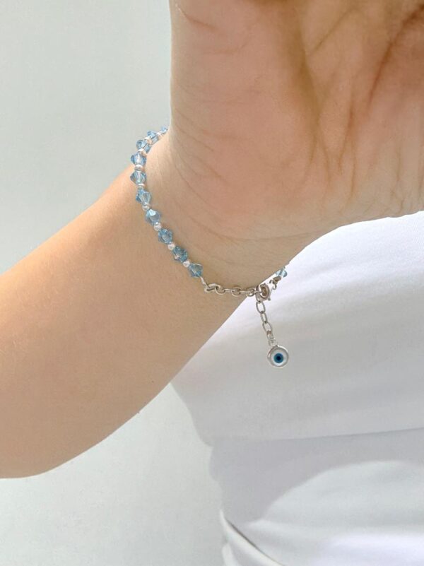 PULSERA DE PLATA CON CRISTAL EUROPEO Y OJITO
