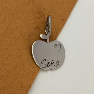 DIJE DE ACERO MODELO "MANZANA SEÑO"