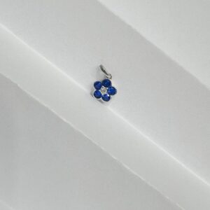 DIJE DE PLATA RODINADA MODELO FLOR AZUL