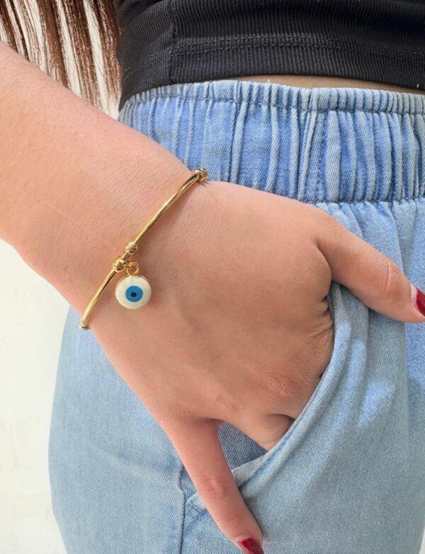 PULSERA DE ACERO DORADO MODELO CON OJITO