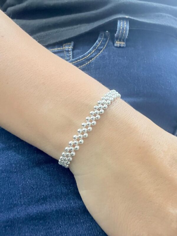 PULSERA DE PLATA MODELO ELASTIZADA CON ESFERAS