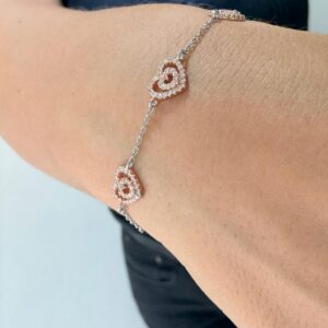 PULSERA DE PLATA RODINADA MODELO CORAZONES ROSE