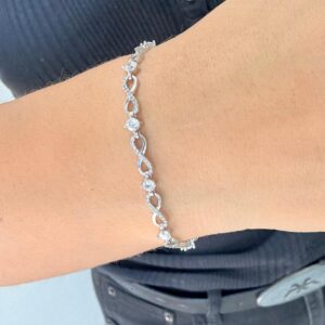 PULSERA DE PLATA RODINADA MODELO INFINITOS CON PIEDRAS