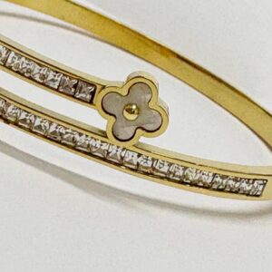 PULSERA DE ACERO DORADO MODELO ESCLAVA CON TREBOLES