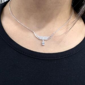 CONJUNTO DE PLATA RODINADA MODELO ALAS CON PIEDRAS