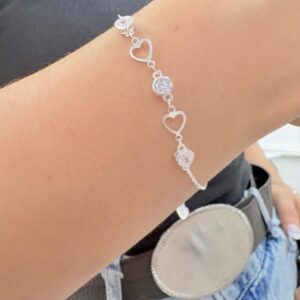 PULSERA DE PLATA RODINADA MODELO CORAZONES CON PIEDRAS