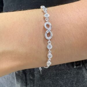PULSERA DE PLATA RODINADA MODELO INFINITO CON PIEDRAS