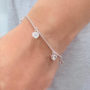 PULSERA DE PLATA MODELO CORAZONES COLGANTES