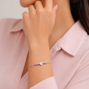 PULSERA DE ACERO BLANCO MODELO CORAZON CON ESFERAS