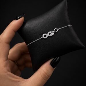 PULSERA DE PLATA RODINADA MODELO DOBLE INFINITO CON PIEDRAS