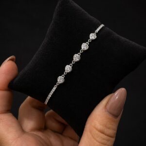 PULSERA DE PLATA RODINADA MODELO CORAZONES CENTRALES