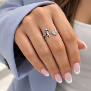 ANILLO DE PLATA RODINADA MODELO CORAZON CON NENE,  AJUSTABLE