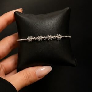 PULSERA DE PLATA MODELO ESFERAS LISAS Y CON DETALLES