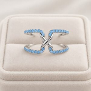 ANILLO AJUSTABLE DE PLATA RODINADA CON PIEDRAS COLOR TURQUESA